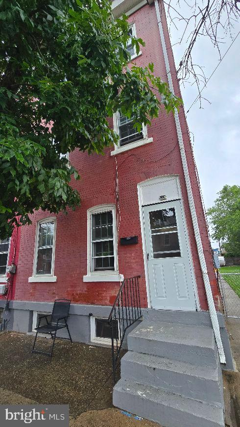1260 E State St, Trenton, NJ 08609 - view of front of house featuring brick siding