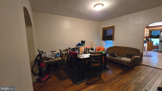 1260 E State St, Trenton, NJ 08609 - dining space with arched walkways and hardwood / wood-style floors