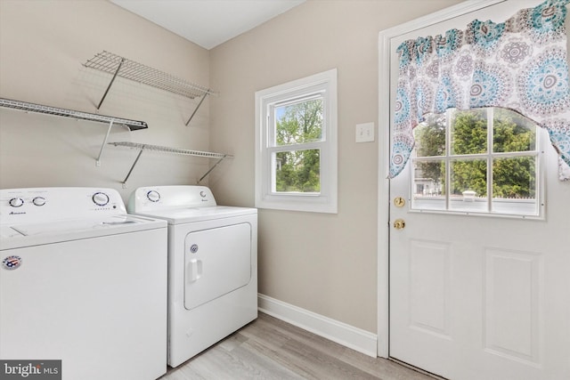 252 N 3rd St, North Wales, PA 19454 - laundry area with washing machine and clothes dryer and light wood-style flooring