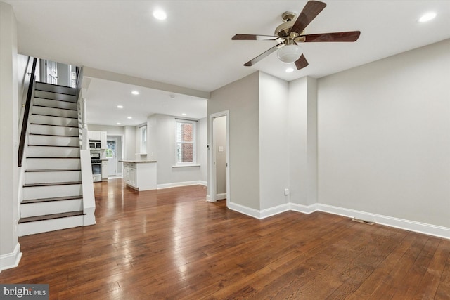 252 N 3rd St, North Wales, PA 19454 - unfurnished living room with hardwood / wood-style floors, stairway, ceiling fan, and recessed lighting