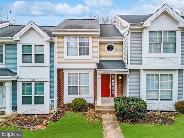 309 Providence St Unit 309, Stafford, VA 22554 - view of front of property featuring a front yard and a shingled roof