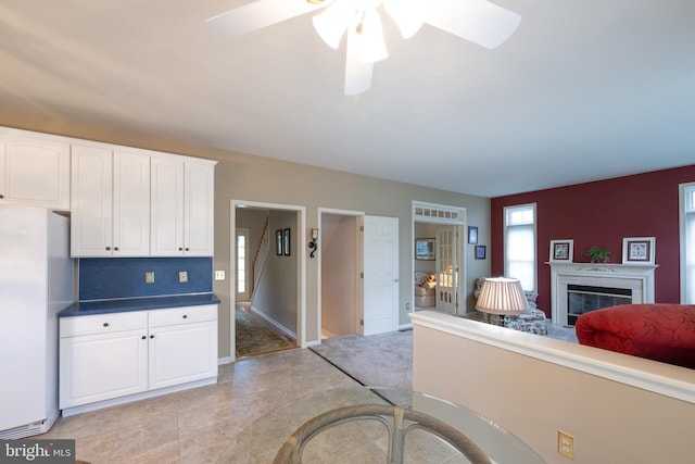 5900 Wayside Dr, Macungie, PA 18062 - living area with ceiling fan and a glass covered fireplace