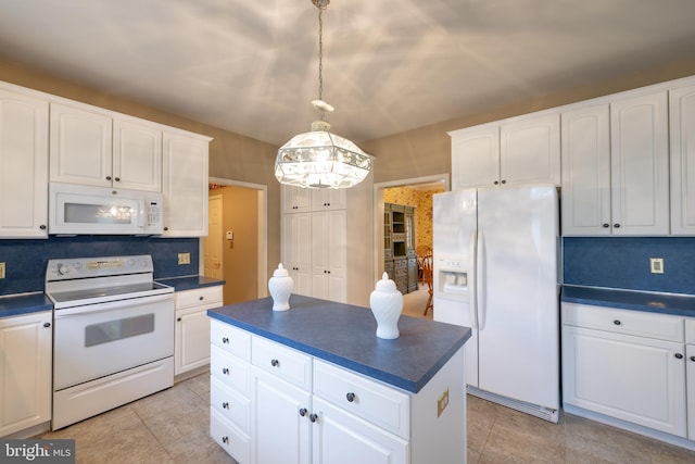 5900 Wayside Dr, Macungie, PA 18062 - kitchen with white appliances, dark countertops, a chandelier, white cabinetry, and a center island