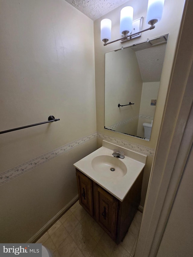14 Riverside Run Dr, Indian Head, MD 20640 - half bathroom featuring a textured ceiling and vanity