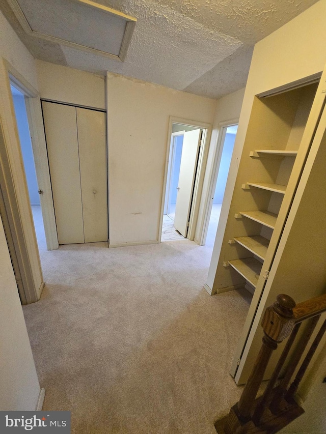 14 Riverside Run Dr, Indian Head, MD 20640 - unfurnished bedroom with carpet floors, a textured ceiling, and a closet