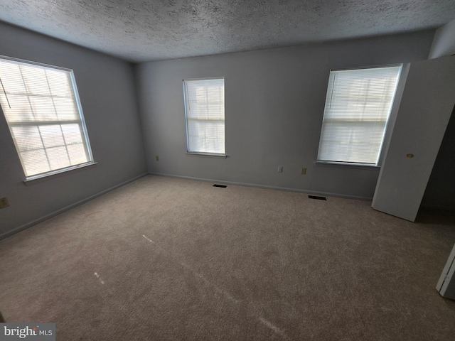 14 Riverside Run Dr, Indian Head, MD 20640 - carpeted empty room with a textured ceiling and baseboards