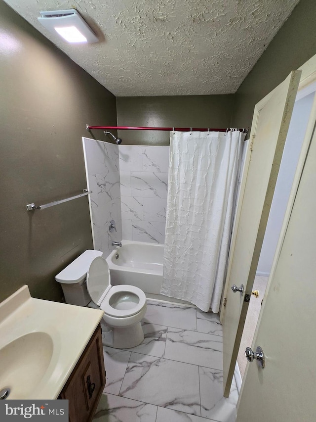 14 Riverside Run Dr, Indian Head, MD 20640 - bathroom featuring vanity, shower / bath combo, marble look tiles, and a textured ceiling