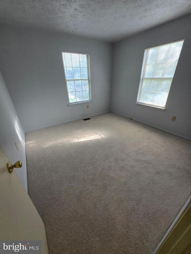 14 Riverside Run Dr, Indian Head, MD 20640 - unfurnished room featuring carpet and a textured ceiling