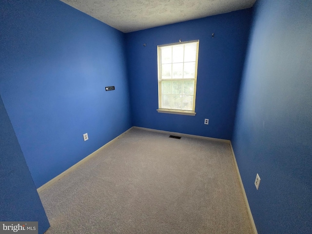 14 Riverside Run Dr, Indian Head, MD 20640 - spare room with carpet floors and a textured ceiling