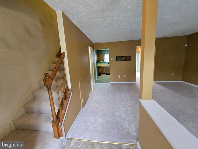 14 Riverside Run Dr, Indian Head, MD 20640 - stairs featuring carpet flooring and a textured ceiling