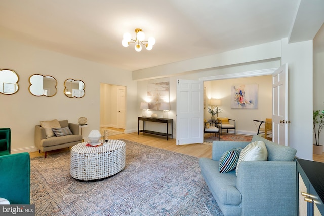 3100 Connecticut Ave NW Unit 434, Washington, DC 20008 - living room featuring wood finished floors and a chandelier