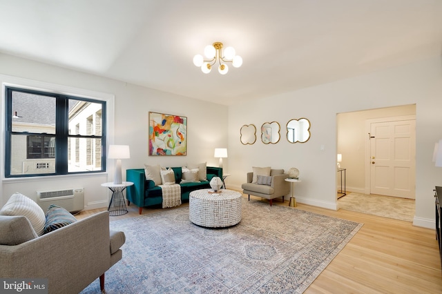 3100 Connecticut Ave NW Unit 434, Washington, DC 20008 - living area with a chandelier, light wood finished floors, and an AC wall unit