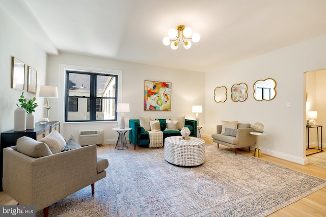 3100 Connecticut Ave NW Unit 434, Washington, DC 20008 - living area featuring a chandelier, wood finished floors, and a wall mounted AC