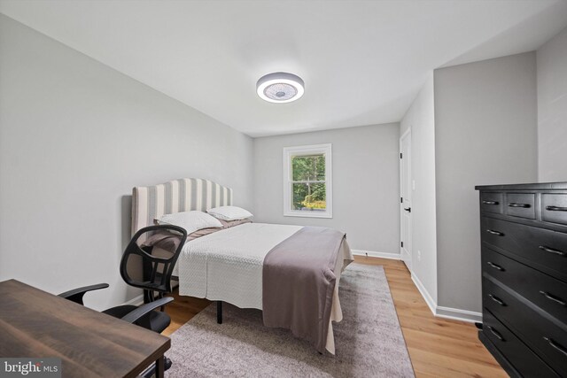 14731 Conway Dr, Manassas, VA 20112 - bedroom featuring light wood-style flooring and baseboards