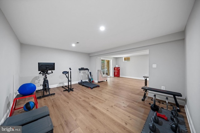 14731 Conway Dr, Manassas, VA 20112 - exercise area with wood finished floors and recessed lighting