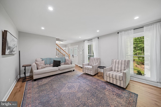14731 Conway Dr, Manassas, VA 20112 - living room with stairway, wood finished floors, and recessed lighting
