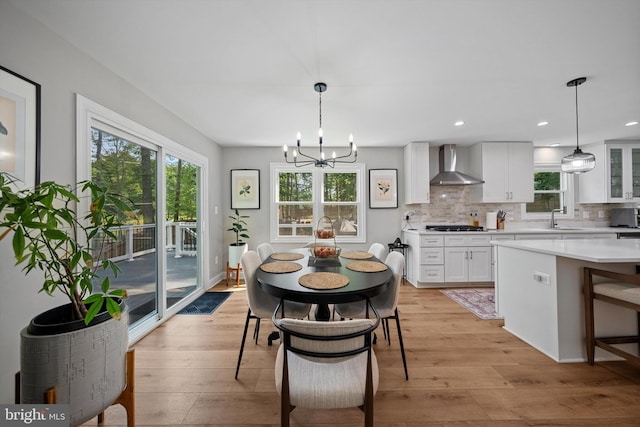 14731 Conway Dr, Manassas, VA 20112 - dining space featuring light wood-style floors, a chandelier, and recessed lighting