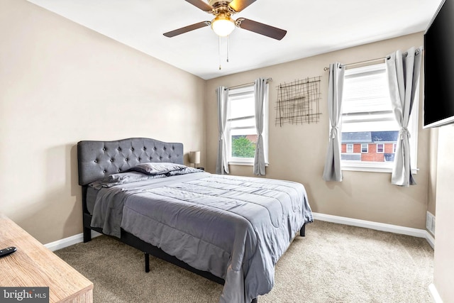 336 Imla St, Baltimore, MD 21224 - carpeted bedroom featuring baseboards and ceiling fan