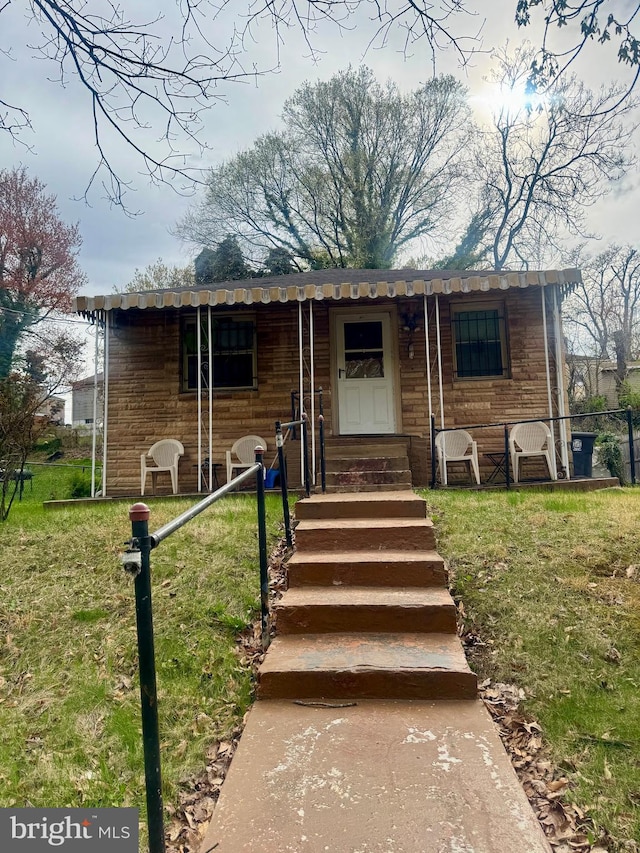 1400 Farmingdale Ave, Capitol Heights, MD 20743 - view of front facade with a front yard and entry steps