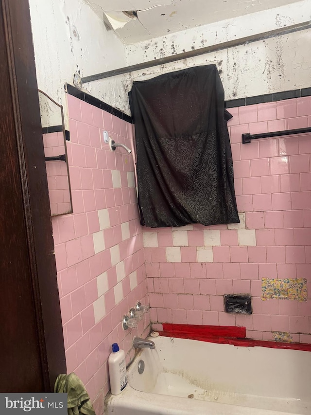 1400 Farmingdale Ave, Capitol Heights, MD 20743 - bathroom featuring tile walls and a wainscoted wall