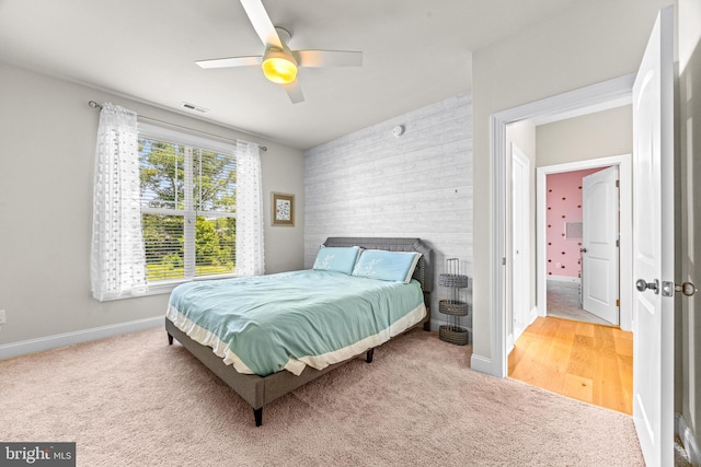 806 Dunfer Hill Rd, Severna Park, MD 21146 - carpeted bedroom with an accent wall and ceiling fan