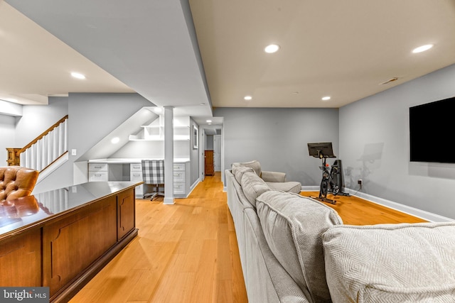 806 Dunfer Hill Rd, Severna Park, MD 21146 - living room with light wood finished floors, recessed lighting, stairs, and decorative columns