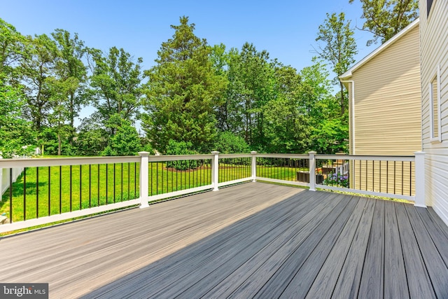 806 Dunfer Hill Rd, Severna Park, MD 21146 - deck featuring a lawn and view of wooded area