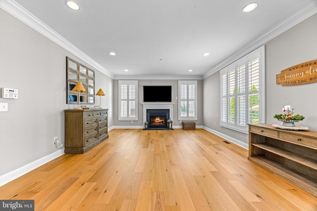 806 Dunfer Hill Rd, Severna Park, MD 21146 - living area with crown molding, light wood-style floors, recessed lighting, and a fireplace with flush hearth