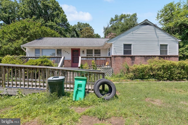 7022 High Bridge Rd, Bowie, MD 20720 - single story home featuring brick siding, a porch, and a front lawn