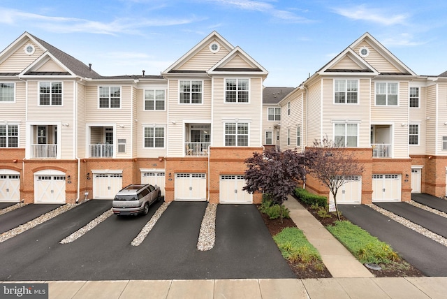 23230 Milltown Knoll Sq Unit 106, Ashburn, VA 20148 - multi unit property featuring driveway and a garage
