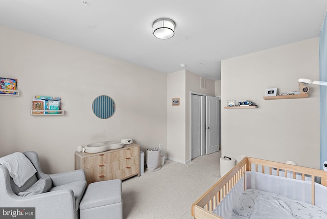 23230 Milltown Knoll Sq Unit 106, Ashburn, VA 20148 - carpeted bedroom with baseboards and a closet
