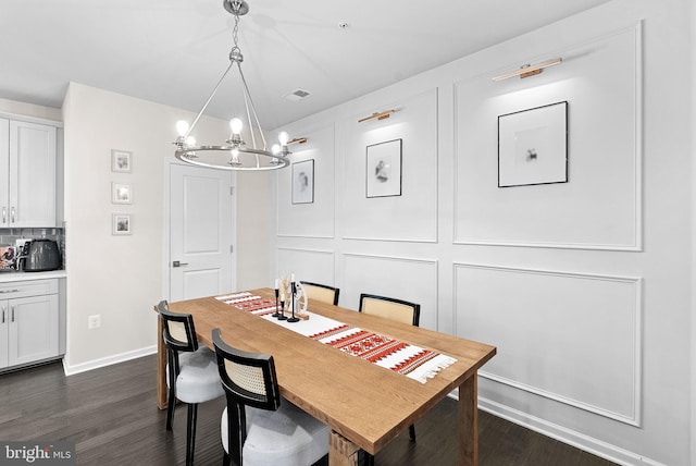 23230 Milltown Knoll Sq Unit 106, Ashburn, VA 20148 - dining area featuring a chandelier and dark wood-style floors