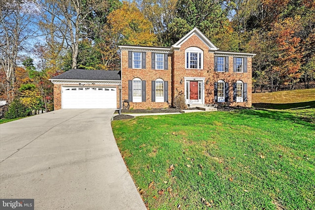 2700 Moores Valley Dr, Baltimore, MD 21209 - view of front of house with brick siding, a garage, driveway, and a front yard