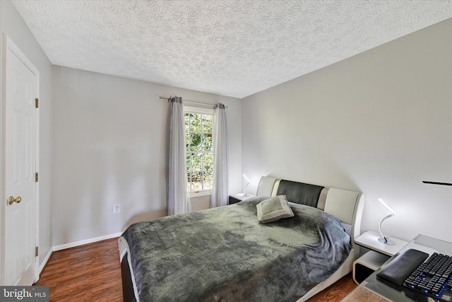 2700 Moores Valley Dr, Baltimore, MD 21209 - bedroom with dark wood finished floors and a textured ceiling
