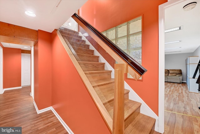 2700 Moores Valley Dr, Baltimore, MD 21209 - staircase with wood finished floors and baseboards