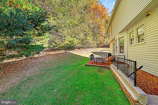2700 Moores Valley Dr, Baltimore, MD 21209 - view of grassy yard with a wooden deck