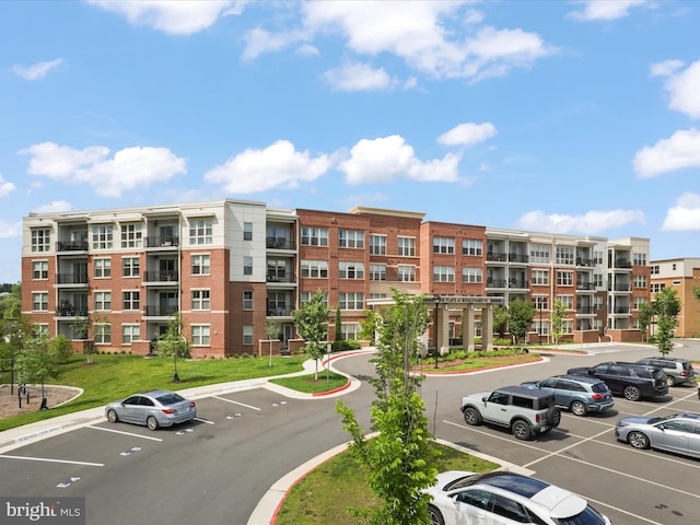 10755 Fairgrounds Dr Unit 223, Fairfax, VA 22030 - view of apartment building / complex featuring uncovered parking