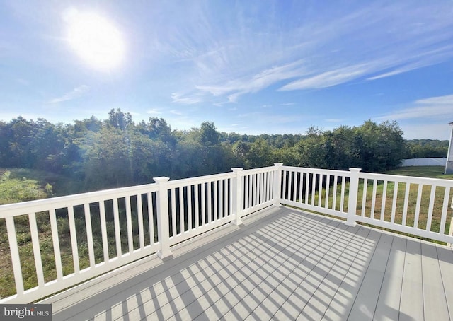 379 Eurasian Dr, Bunker Hill, WV 25413 - deck with a forest view