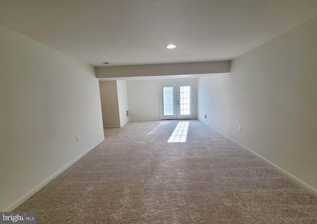 379 Eurasian Dr, Bunker Hill, WV 25413 - empty room with light colored carpet, french doors, and recessed lighting