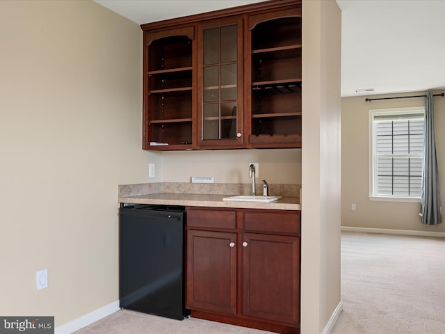 114 Renee Ln, Winchester, VA 22602 - indoor wet bar with light colored carpet and refrigerator