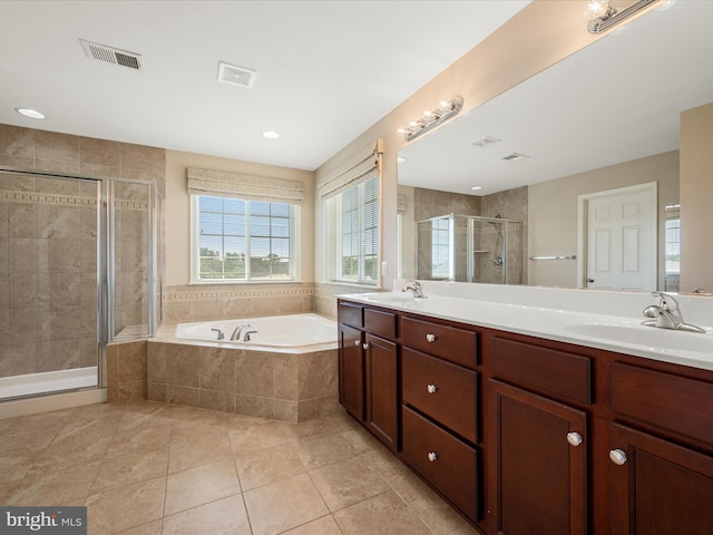 114 Renee Ln, Winchester, VA 22602 - bathroom with a garden tub, a shower stall, double vanity, tile patterned floors, and recessed lighting