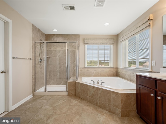 114 Renee Ln, Winchester, VA 22602 - full bath featuring vanity, a bath, a shower stall, recessed lighting, and tile patterned flooring