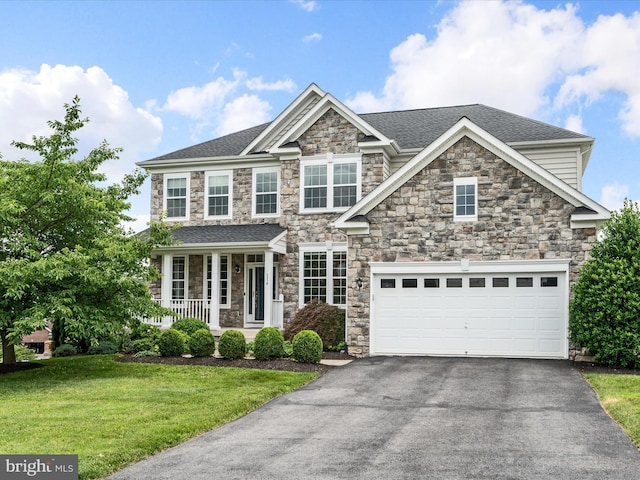 114 Renee Ln, Winchester, VA 22602 - craftsman inspired home with stone siding, driveway, a front yard, and covered porch