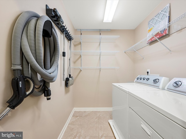 114 Renee Ln, Winchester, VA 22602 - laundry room featuring washer and clothes dryer and light tile patterned flooring