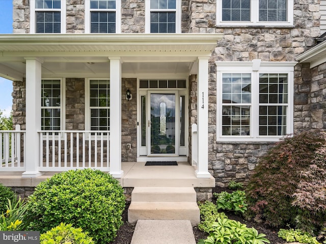 114 Renee Ln, Winchester, VA 22602 - doorway to property featuring stone siding and covered porch