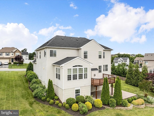 114 Renee Ln, Winchester, VA 22602 - rear view of house featuring a lawn, a deck, a shingled roof, and a residential view