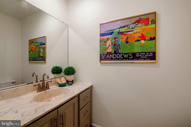 6128 Buckingham Manor Dr, Baltimore, MD 21210 - half bathroom featuring vanity and toilet