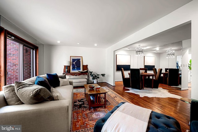 6128 Buckingham Manor Dr, Baltimore, MD 21210 - living area with a chandelier, wood finished floors, and recessed lighting
