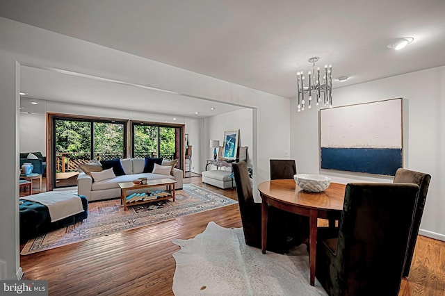6128 Buckingham Manor Dr, Baltimore, MD 21210 - dining area featuring wood finished floors and a chandelier
