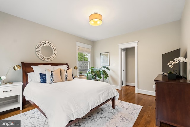 2407 N Nelson St, Arlington, VA 22207 - bedroom with dark wood-type flooring and baseboards